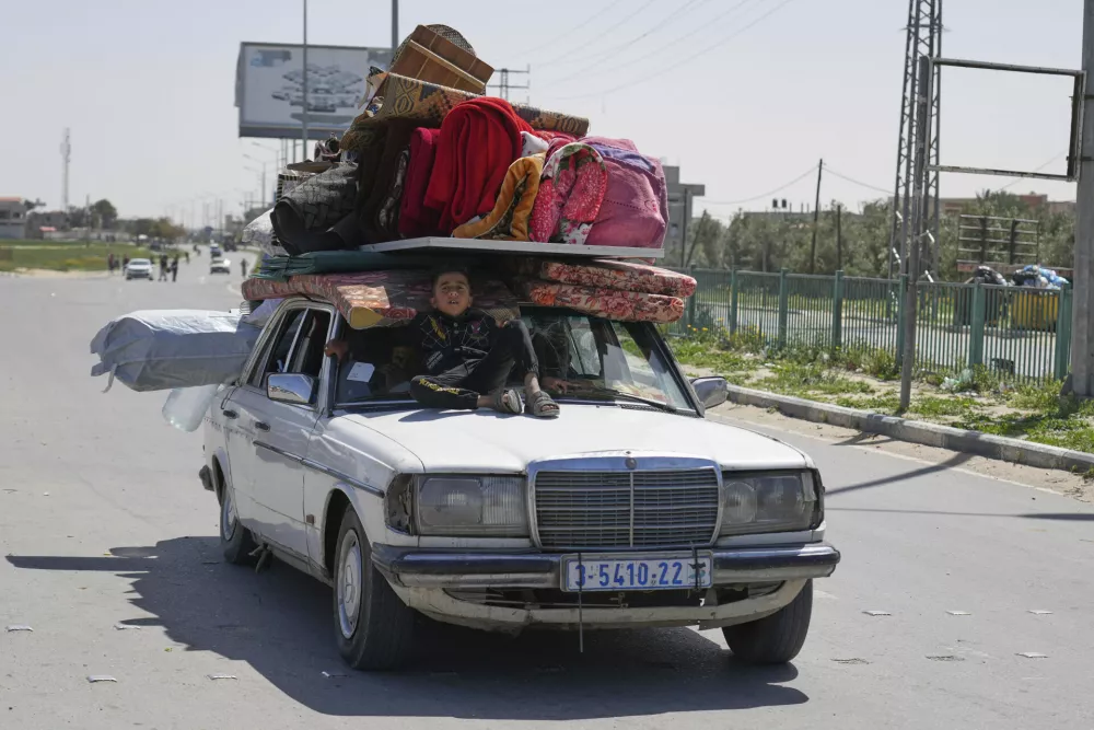 FILE - Palestinians who fled Rafah after Israeli evacuation orders, arrive in Khan Younis, Gaza, on Monday, March 31, 2025. (AP Photo/Abdel Kareem Hana, File)