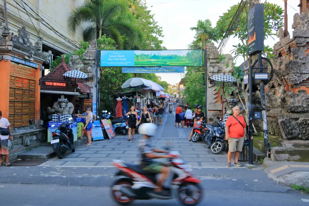 Ubud, Bali in Indonesia - January 30 2024: local people enjoy the city by motorbike