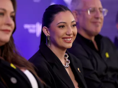 Israel's Eurovision 2025 representative and survivor of the October 7, 2023 attack, Yuval Raphael, attends a press conference after premiering her song 'New Day Will Rise' in Tel Aviv, Israel March 9, 2025. REUTERS/Ronen Zvulun
