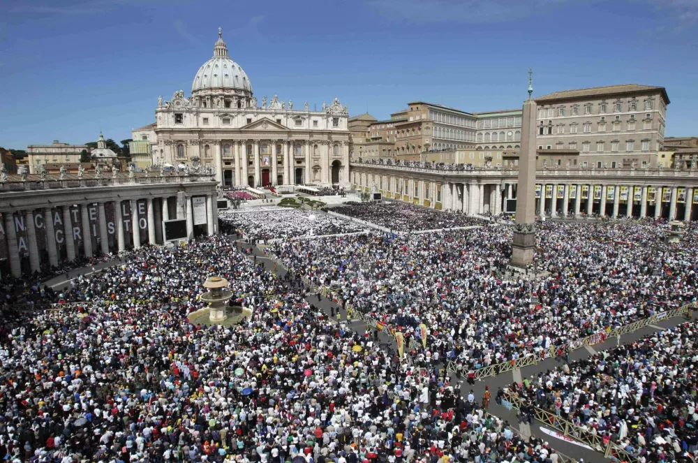 Faithful crowd St. Peter's Square at the Vatican, Sunday, May 1, 2011. Pope Benedict XVI beatified Pope John Paul II before more than a million faithful in St. Peter's Square and surrounding streets Sunday, moving the beloved former pontiff one step closer to possible sainthood. (AP Photo/Pier Paolo Cito)