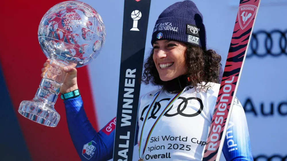FILE PHOTO: Mar 27, 2025; Sun Valley, ID, USA; World Cup overall points winner Federica Brignone of Italy celebrates with the crystal globe after the 2025 FIS Ski World Cup at Sun Valley. Mandatory Credit: Christopher Creveling-Imagn Images/File Photo