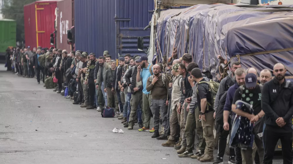 Captured Romanian mercenaries, who were fighting alongside Democratic Republic of Congo army (FRDC), wait to be released by M23 rebels at Gisenyi border point in Congo, Wednesday, Jan. 29, 2025, after the M23 rebels advanced into eastern Congo's capital Goma. (AP Photo/Brian Inganga)