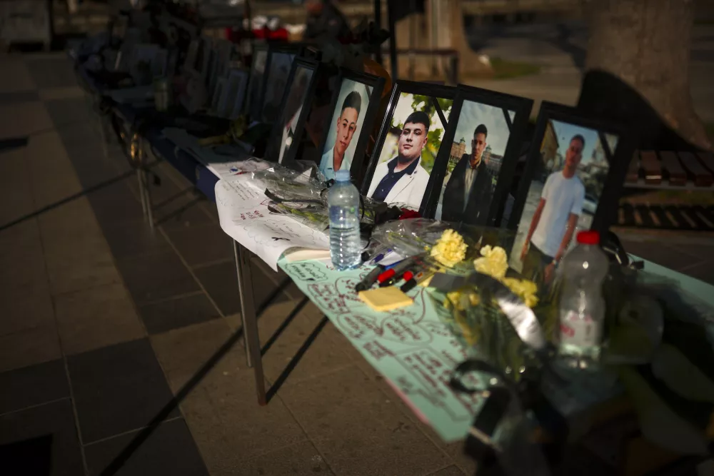 Photographs of the victims of a massive nightclub fire are displayed at a square in Kocani, North Macedonia, Thursday, March 20, 2025. (AP Photo/Armin Durgut)