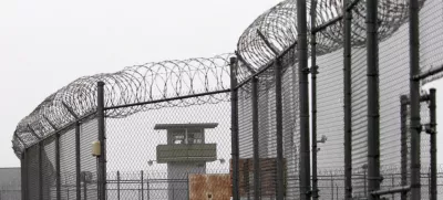 FILE - A guard tower and barbed wire fencing stand outside Sing Sing, Sunday, Feb. 16, 2020 in Ossining, N.Y. (AP Photo/Mark Lennihan, File)