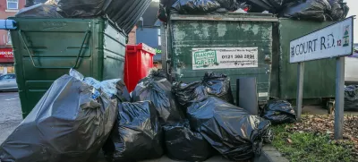 Rubbish on the street in Court Road, Balsall Heath, Birmingham, as bin workers strike for 12 days in February, February 6 2025. Release date February 10 2025. Shocking photos show mountains of fly-tipped rubbish and overflowing bins along Birmingham's streets after bin workers went on strike. Residents say the bankrupt city is now being invaded by giant rats after industrial action left neighbourhoods littered with festering mounds of waste. Families also say they fear for the health of their children after some residential areas were turned into a "makeshift dump" which "stinks". Refuse collectors have walked out on seven dates so far and have scheduled in at least 24 other days in response to fears of wide-scale pay cuts. And the impact of the strikes can already be seen in the Balsall Heath and Small Heath areas of the second city. Locals there say recycling collection is often ignored and businesses in the area haven't had a waste collection in three weeks.