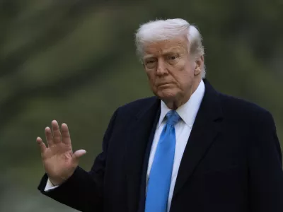 President Donald Trump waves as he arrives at the White House on Marine One, Sunday, April 6, 2025, in Washington. (AP Photo/Manuel Balce Ceneta)