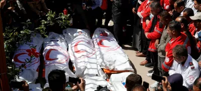 FILE PHOTO: Palestinians mourn medics, who came under Israeli fire while on a rescue mission, after their bodies were recovered, according to the Red Crescent, at Nasser hospital in Khan Younis in the southern Gaza Strip March 31, 2025. REUTERS/Hatem Khaled/File Photo