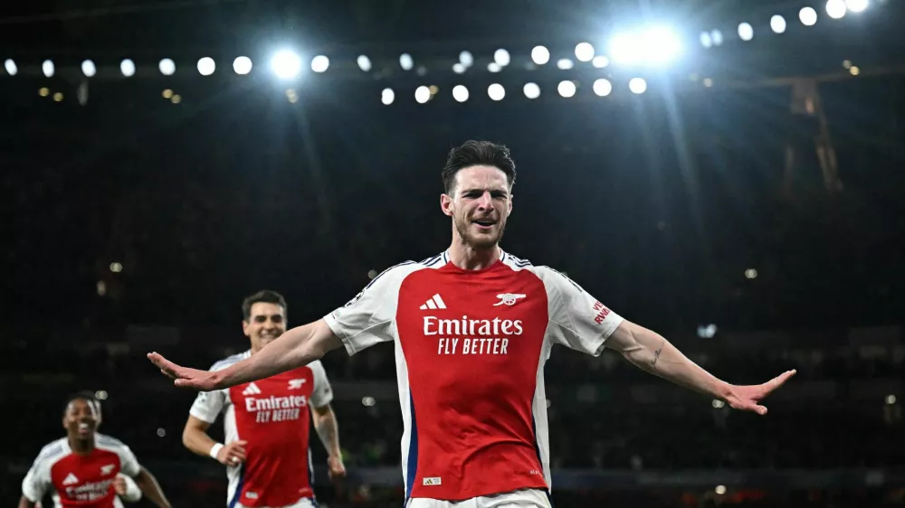 Soccer Football - Champions League - Quarter Final - First Leg - Arsenal v Real Madrid - Emirates Stadium, London, Britain - April 8, 2025 Arsenal's Declan Rice celebrates scoring their second goal REUTERS/Dylan Martinez   TPX IMAGES OF THE DAY