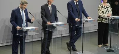 Markus Soeder, chairman of Bavarian¥s Christian Social Union party, Friedrich Merz, Christian Democratic Union party chairman and the Social Democratic Party co-leaders Lars Klingbeil and Saskia Esken, brief the media after reaching an agreement between their parties on a coalition for a new German government at a news conference in Berlin, Germany, Wednesday, April 9, 2025. (AP Photo/Markus Schreiber)