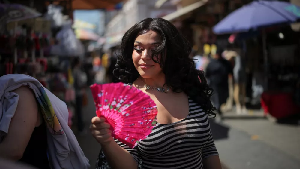 Zaya Perysian, a 22-year-old trans woman who is suing the Trump administration over the sex designation in her passport, poses for a portrait in downtown Los Angeles, California, U.S., April 8, 2025. REUTERS/Daniel Cole