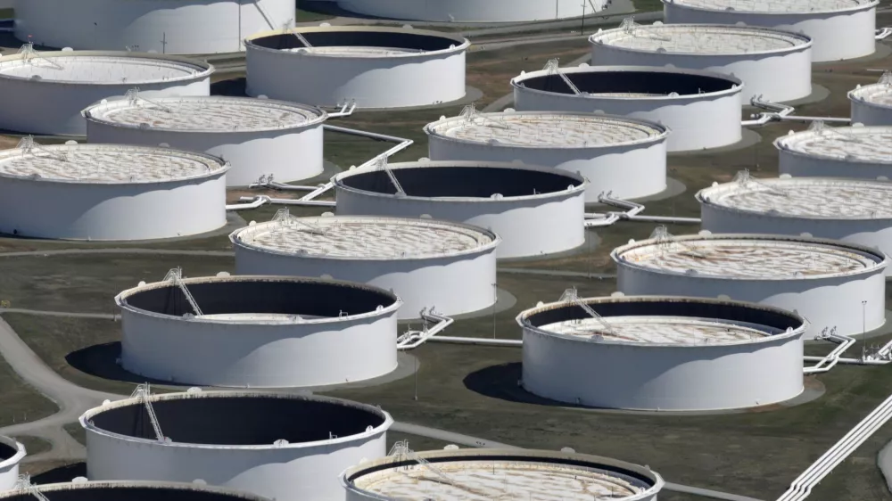 FILE PHOTO: Crude oil storage tanks are seen from above at the Cushing oil hub, Oklahoma, March 24, 2016. REUTERS/Nick Oxford//File Photo