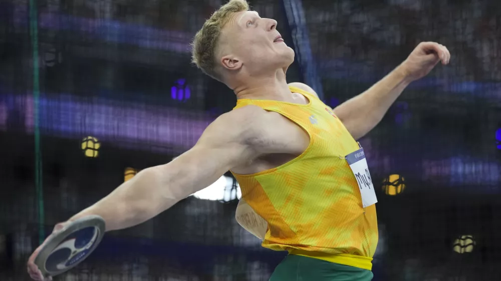 FILE - Mykolas Alekna, of Lithuania, competes in the 2024 Summer Olympics, Wednesday, Aug. 7, 2024, in Saint-Denis, France. (AP Photo/Bernat Armangue, File)
