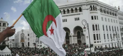 People chant slogans and wave flags during a demonstration in Algiers, Algeria, Wednesday, April 10, 2019. The Algerian senator Abdelkader Bensalah named to temporarily fill the office vacated by former President Abdelaziz Bouteflika said he would act quickly to arrange an "honest and transparent" election to usher in an "Algeria of the future." (AP Photo/Mosa'ab Elshamy)