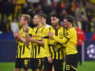 15 April 2025, North Rhine-Westphalia, Dortmund: Dortmund players thank their fans after the UEFA Champions League quarter-final second leg soccer match between Borussia Dortmund and FC Barcelona at the Signal Iduna Park. Photo: Bernd Thissen/dpa