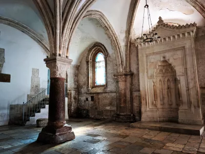 This is the Cenacle, also known as the Upper Room, a significant historical site on Mount Zion in Jerusalem, Middle East. Renowned for its Gothic-style architecture, this sacred space is traditionally believed to be the location of the Last Supper. The room holds immense spiritual importance for both Christians and Jews, making it a prominent religious landmark.