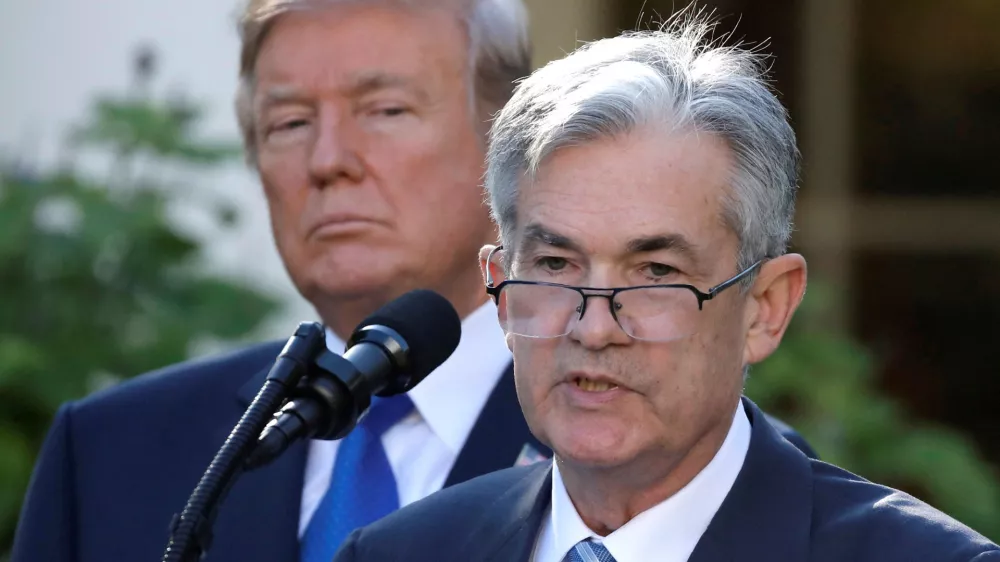 FILE PHOTO: U.S. President Donald Trump looks on as Jerome Powell, his nominee to become chairman of the U.S. Federal Reserve, speaks at the White House in Washington, U.S., November 2, 2017. REUTERS/Carlos Barria/File Photo