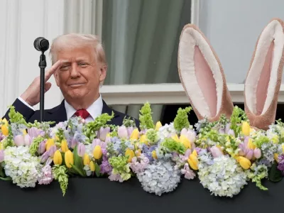 U.S. President Donald Trump salutes as he attends the annual White House Easter Egg Roll event, at the White House in Washington, D.C., U.S., April 21, 2025. REUTERS/Ken Cedeno   TPX IMAGES OF THE DAY