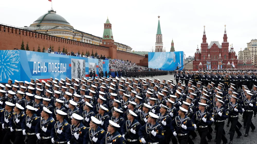 Russian service members march during a military parade on Victory Day, which marks the 76th anniversary of the victory over Nazi Germany in World War Two, in Red Square in central Moscow, Russia May 9, 2021. REUTERS/Maxim Shemetov