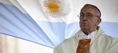 FILE - In this Aug. 7, 2009 file photo, Argentina's Cardinal Jorge Bergoglio gives a Mass outside the San Cayetano church where an Argentine flag hangs behind in Buenos Aires, Argentina. (AP Photo/Natacha Pisarenko, file)