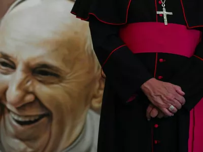 An image of Pope Francis is seen during a Mass in his memory at the Caracas Cathedral, following the death of the pontiff, in Caracas, Venezuela April 21, 2025. REUTERS/Maxwell Briceno