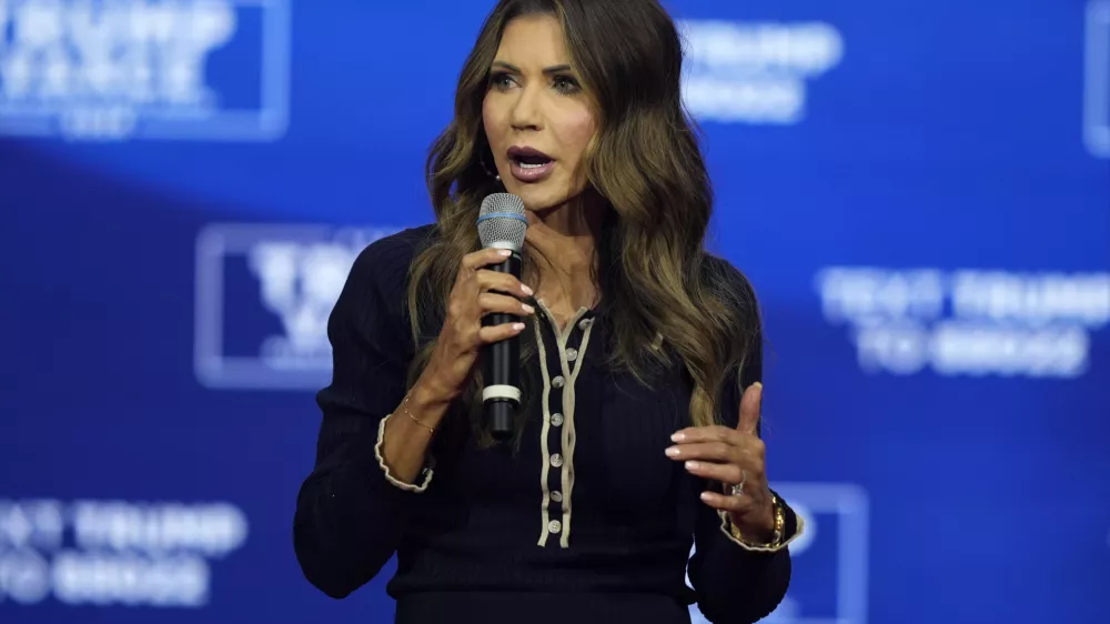 FILE - South Dakota Gov. Kristi Noem speaks before Republican presidential nominee former President Donald Trump at a campaign town hall, Oct. 14, 2024, in Oaks, Pa. (AP Photo/Matt Rourke, File)