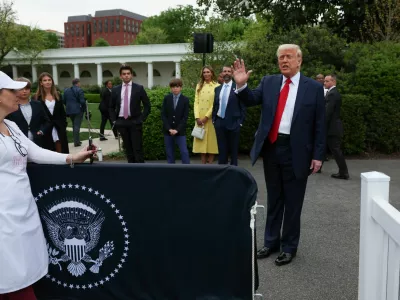 U.S. President Donald Trump attends the annual White House Easter Egg Roll, on the South Lawn of the White House in Washington, D.C., U.S., April 21, 2025. REUTERS/Leah Millis