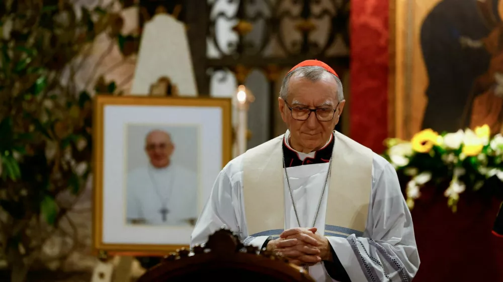 FILE PHOTO: The Vatican's Secretary of State Cardinal Pietro Parolin looks on at the end of the Rosary for Pope Francis at the Papal Basilica of Saint Mary Major (Santa Maria Maggiore), following the death of the pontiff, in Rome, Italy, April 22, 2025. REUTERS/Susana Vera/File Photo