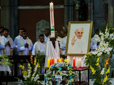 Christians attend a service for the late Pope Francis at the Sacred Heart Cathedral Church, in Lahore, Pakistan Thursday, April 24, 2025. (AP Photo/K.M. Chaudary)