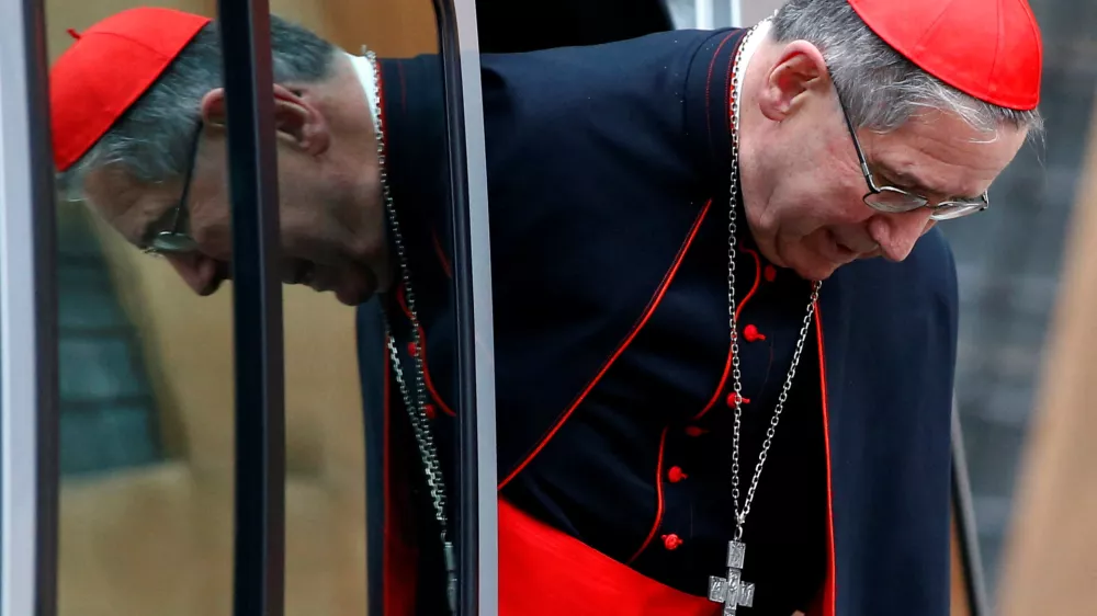 FILE PHOTO: Cardinal Roger Michael Mahony arrives to attend a consistory at the Vatican February 13, 2015. REUTERS/Tony Gentile/File Photo