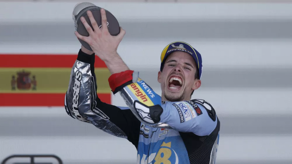 MotoGP - Spanish Grand Prix - Circuito de Jerez, Jerez, Spain - April 27, 2025 BK8 Gresini Racing MotoGP's Alex Marquez celebrates on the podium with the trophy after winning the race REUTERS/Jon Nazca