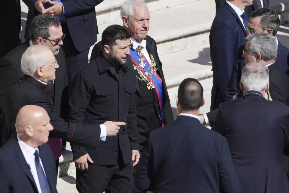 Ukraine's President Volodymr Zelenskyy, center, arrives for the funeral of Pope Francis in St. Peter's Square at the Vatican, Saturday, April 26, 2025. (AP Photo/Markus Schreiber)