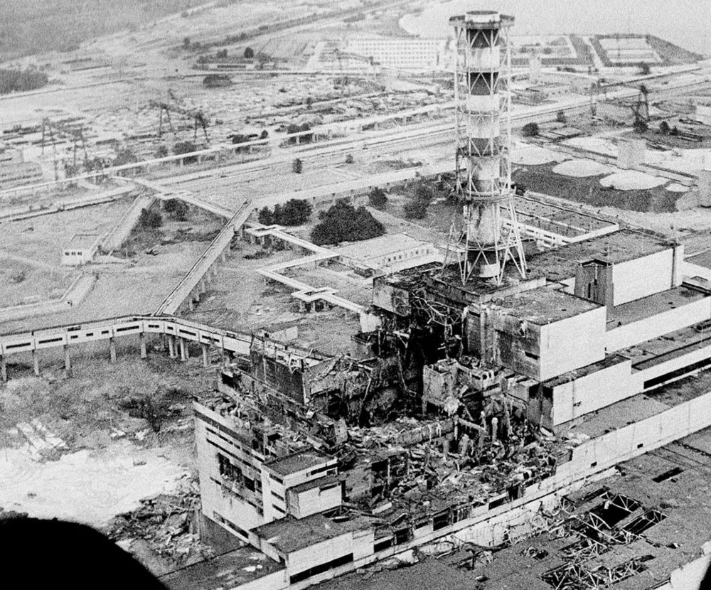 FILE - This April 1986 aerial file photo shows the Chernobyl nuclear power plant, the site of the world's worst nuclear accident, as made two to three days after the explosion in Chernobyl, Ukraine. Japan raised the crisis level at its crippled nuclear plant Tuesday April 12, 2011, to a severity on par with the 1986 Chernobyl disaster, citing high overall radiation leaks that have contaminated the air, tap water, vegetables and seawater. Japanese nuclear regulators said they raised the rating from 5 to 7 _ the highest level on an international scale of nuclear accidents overseen by the International Atomic Energy Agency _ after new assessments of radiation leaks from the Fukushima Dai-ichi plant since it was disabled by the March 11 tsunami. (AP Photo/File)