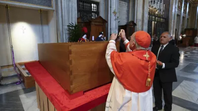 Cardinal Camerlengo Kevin Joseph Farrell puts a seal on the coffin of late Pope Francis during the burial ceremony inside St. Mary Major Basilica in Rome Saturday, April 26, 2025. (Vatican Media via AP)