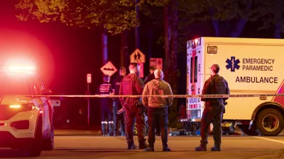 Vancouver police secure the scene after a car drove into a crowd at the Lapu Lapu Festival in Vancouver, British Columbia, Saturday April 26, 2025. (Rich Lam/The Canadian Press via AP)