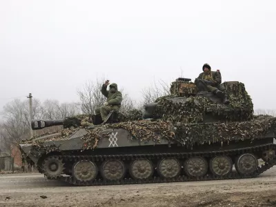 FILE - In this image made from a video distributed by the Russian Defense Ministry Press Service on Friday, March 14, 2025, Russian soldiers ride on a self-propelled gun in Russia's Kursk region. (Russian Defense Ministry Press Service via AP, File)