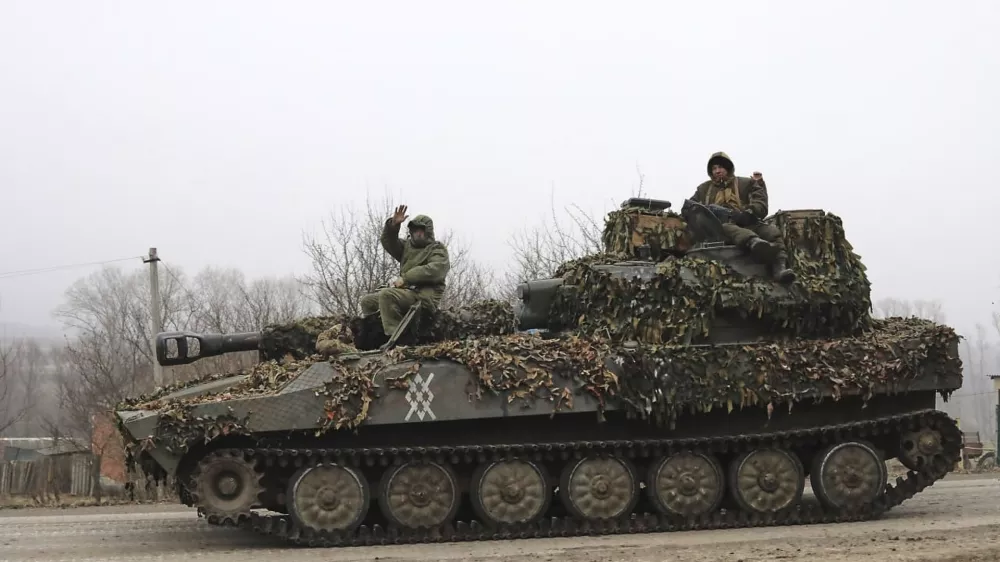 FILE - In this image made from a video distributed by the Russian Defense Ministry Press Service on Friday, March 14, 2025, Russian soldiers ride on a self-propelled gun in Russia's Kursk region. (Russian Defense Ministry Press Service via AP, File)
