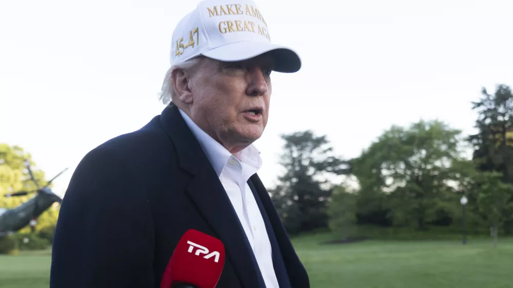 President Donald Trump speaks to reporters as he arrives at the White House, Sunday, April 27, 2025, in Washington. (AP Photo/Manuel Balce Ceneta)