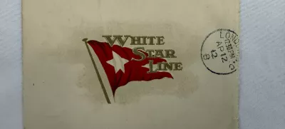 This undated handout picture provided by the auctioneers Henry Aldridge & Son, England, shows a lettercard, penned by one of the Titanic's most well-known survivors from onboard the ship days before it sank, which has sold for 300,000 pounds (9,000) at auction. (Henry Aldridge & Son via AP)