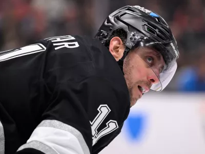 Apr 5, 2025; Los Angeles, California, USA; Los Angeles Kings center Anze Kopitar (11) during a break in the action against the Edmonton Oilers at Crypto.com Arena. Mandatory Credit: Robert Hanashiro-Imagn Images