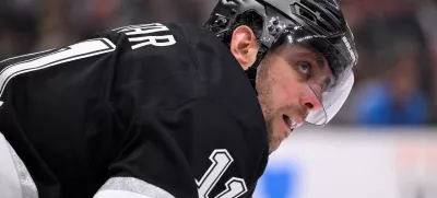 Apr 5, 2025; Los Angeles, California, USA; Los Angeles Kings center Anze Kopitar (11) during a break in the action against the Edmonton Oilers at Crypto.com Arena. Mandatory Credit: Robert Hanashiro-Imagn Images