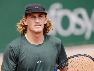 FILED - 27 May 2024, France, Paris: Australian tennis player Max Purcell in action against Germany's Henri Squire during their men's singles first round match of the French Open tennis Tournament in Paris. Purcell will not be allowed to participate in or attend tournaments until mid-2026 because of his doping violation. Photo: Frank Molter/dpa