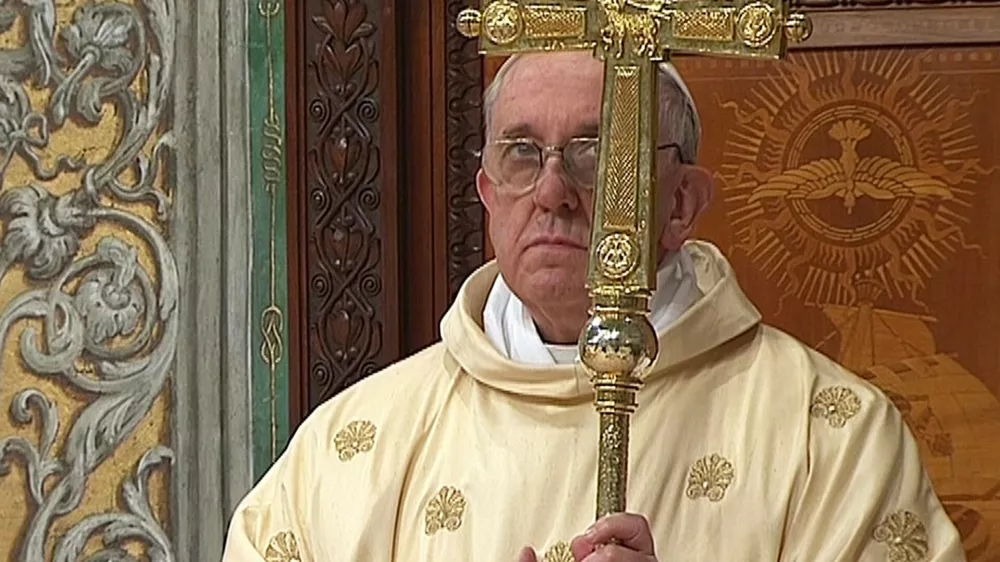 Newly elected Pope Francis I, Cardinal Jorge Mario Bergoglio of Argentina, leads a a mass with cardinals at the Sistine Chapel, in a still image taken from video at the Vatican March 14, 2013. Argentine Cardinal Jorge Bergoglio surprised the world on Wednesday when he ended a run of nearly 1,300 years of European popes and greeted St. Peter's Square for the first time as Pope Francis.  REUTERS/Vatican CTV via Reuters Tv (VATICAN - Tags: RELIGION) FOR EDITORIAL USE ONLY. NOT FOR SALE FOR MARKETING OR ADVERTISING CAMPAIGNS.