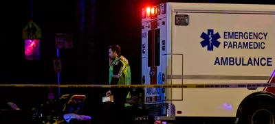 An ambulance is parked at the site of the Lapu Lapu day block party, where a vehicle drove into a crowd killing several people in Vancouver, British Columbia, Canada April 26, 2025. REUTERS/Jennifer Gauthier