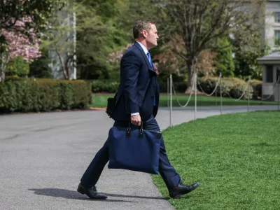 U.S. National Security Advisor Mike Waltz walks to board Marine One, in Washington, D.C., U.S., April 3, 2025. REUTERS/Carlos Barria
