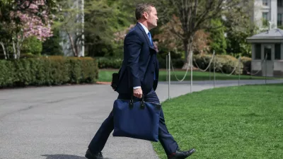 U.S. National Security Advisor Mike Waltz walks to board Marine One, in Washington, D.C., U.S., April 3, 2025. REUTERS/Carlos Barria