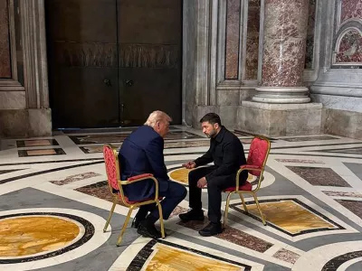 In this photo provided by the Ukrainian Presidential Press Office, Ukraine's President Volodymyr Zelenskyy, right, and President Donald Trump, talk as they attend the funeral of Pope Francis in Vatican, Saturday, April 26, 2025.(Ukrainian Presidential Press Office via AP)