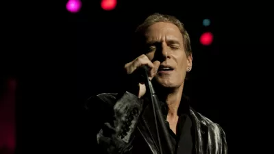 michael bolton performing live at the royal albert hall on mon the 2nd nov 2009 he is an american singer/songwriter whos hard rock band "blackjack" toured with ozzy osborne his solo career began in 1975 but success came in the late 80s early 90s with his album "time,love and tenderness" which featured his grammy award winning cover of the motown classic "when a man loves a women" his latest album featuring other artists such as lady gaga and ne-yo was released in sept 2009 and is called "one world one love".,,Image: 40377411, License: Rights-managed, Restrictions:, Model Release: no