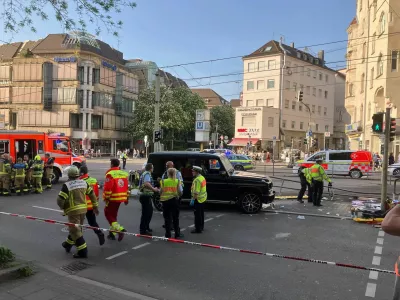 02 May 2025, Baden-W&uuml;rttemberg, Stuttgart: Police officers and emergency workers present at the scene where a car drove into people. According to police, a car has driven into a group of people in Stuttgart city center. Three people have been injured so far. The driver has been arrested, a police spokeswoman said. Photo: Marco Krefting/dpa