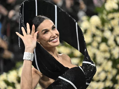 Demi Moore attends The Metropolitan Museum of Art's Costume Institute benefit gala celebrating the opening of the "Superfine: Tailoring Black Style" exhibition on Monday, May 5, 2025, in New York. (Photo by Evan Agostini/Invision/AP)