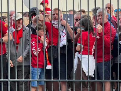 FILE PHOTO: Soccer Football - Champions League Final - Liverpool v Real Madrid - Stade de France, Saint-Denis near Paris, France - May 28, 2022 Liverpool fans react as they queue to access Stade de France before Champions League Final  REUTERS/Fernando Kallas/File Photo